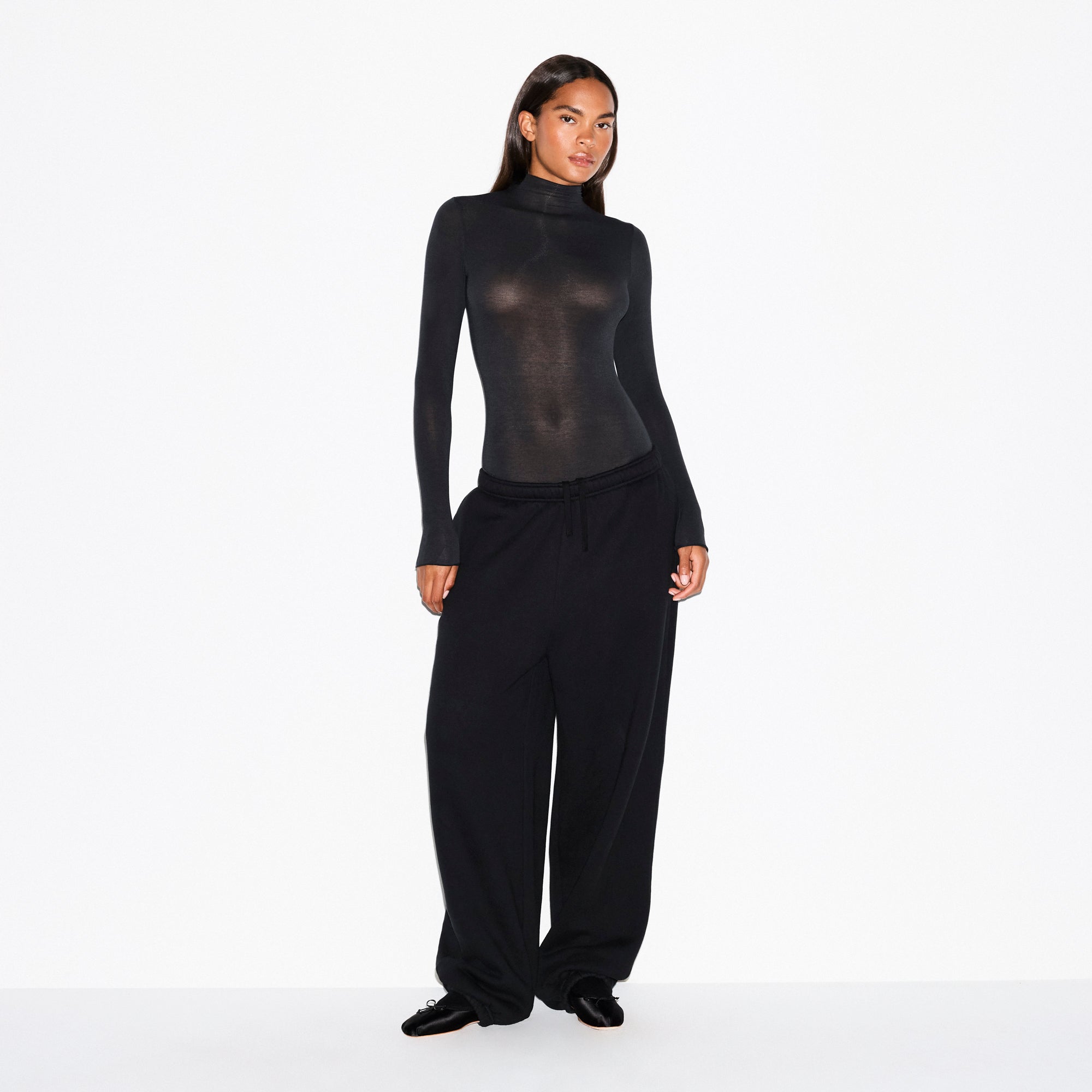 SKIMS SHEER MODAL LONG SLEEVE TURTLENECK BODYSUIT | ONYX - Mind Türkiye