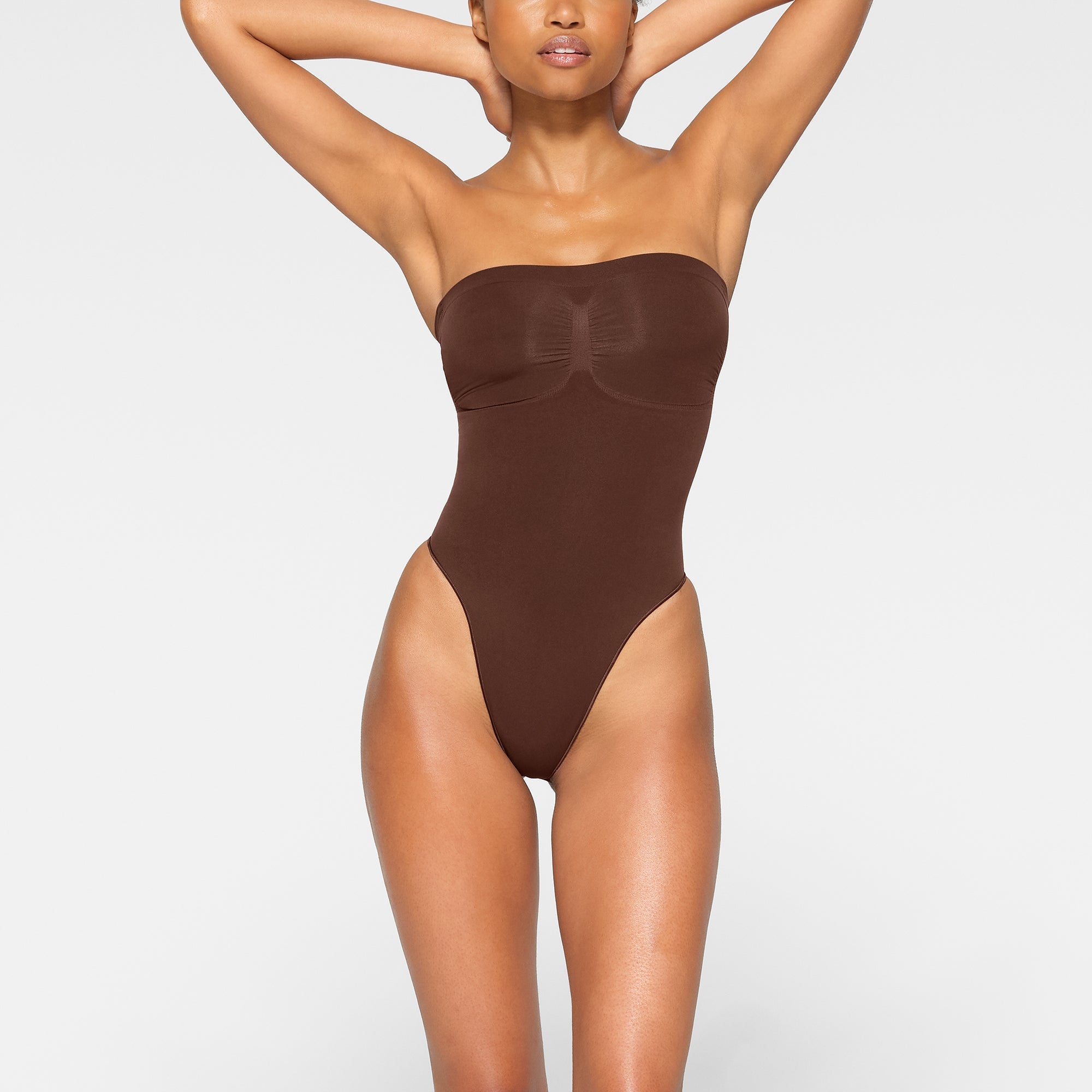 SKIMS SEAMLESS SCULPT STRAPLESS THONG BODYSUIT | COCOA - Mind Türkiye